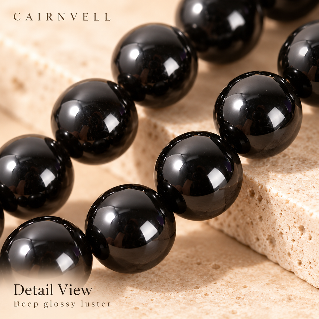 Natural black obsidian round beads close-up detail