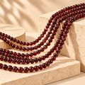 Natural garnet round beads supplier grade 1A, styled product image