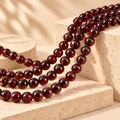 Natural garnet round beads supplier grade 3A, styled product image